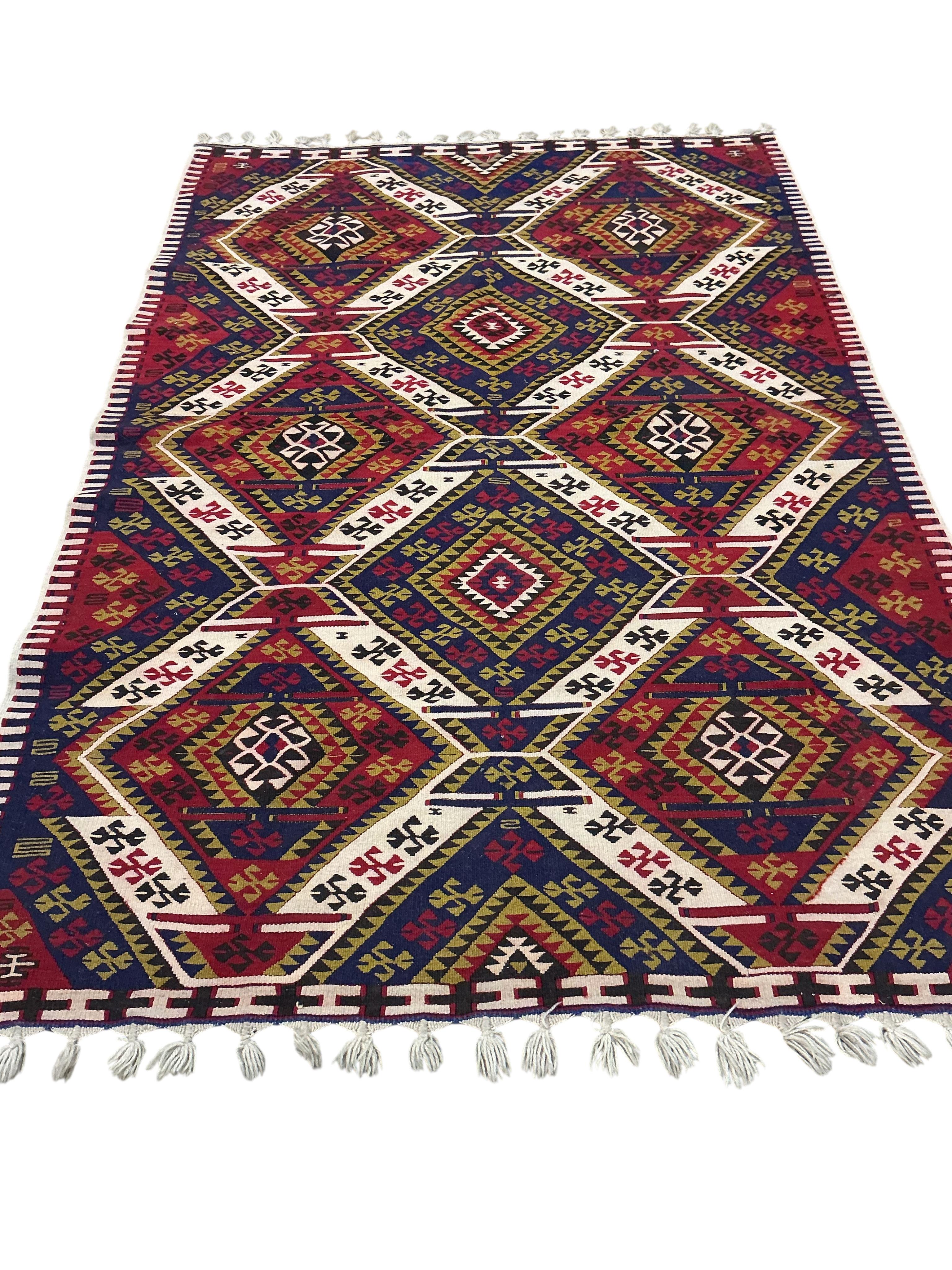A Kilim polychrome flatweave rug, 200 x 140cm